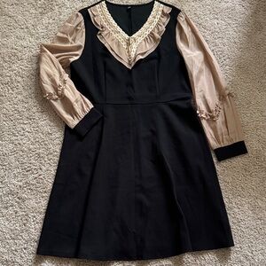 Elegant Black and Tan Dress with Lace Detail